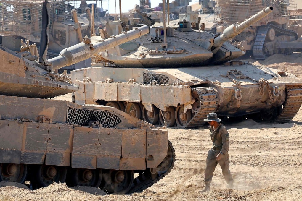 Israeli troops deployed by Israel’s border fence with the Gaza Strip on July 10 amid the ongoing war with the Palestinian militant movement Hamas. Photo: AFP