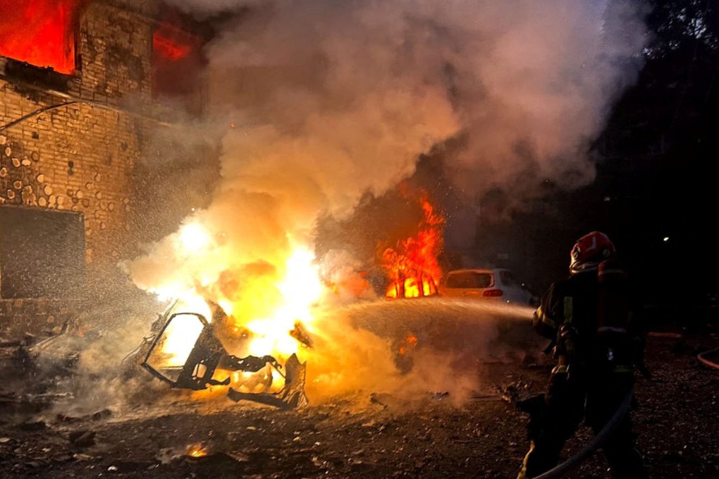 A firefighter works at the site of a Russian drone strike in Lviv, Ukraine on Saturday. Photo: Press service of the State Emergency Service of Ukraine/Reuters