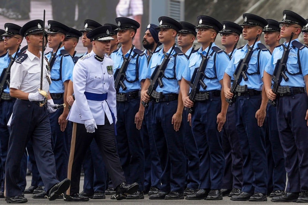 Commissioner of Police Joe Chow inspects the force’s new recruits on Saturday. Photo: Elson Li