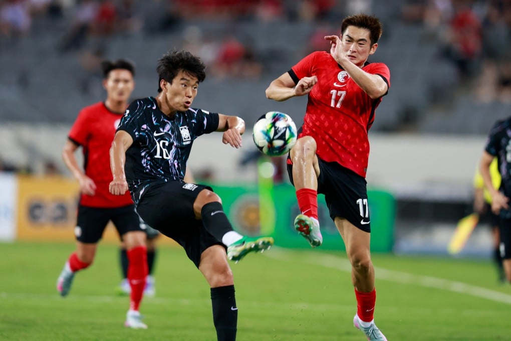 Hong Kong left-back Shinichi Chan (right) in action against South Korea in the East Asian Football Championship. Photo: Xinhua