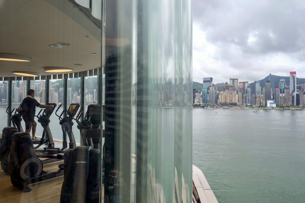 A man exercises in a hotel on the waterfront in Tsim Sha Tsui. Photo: Sam Tsang