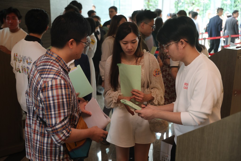 Potential buyers queue up at Sun Hung Kai Properties’ sales office for a chance to buy a flat in the developer’s Novo Land project during an earlier round of sales on June 22. Photo: Edmond So