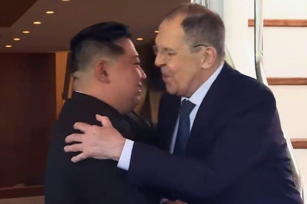 Russian Foreign Minister Sergey Lavrov hugs North Korean leader Kim Jong-un in Wonsan on Saturday. Photo: Russian foreign ministry via AFP