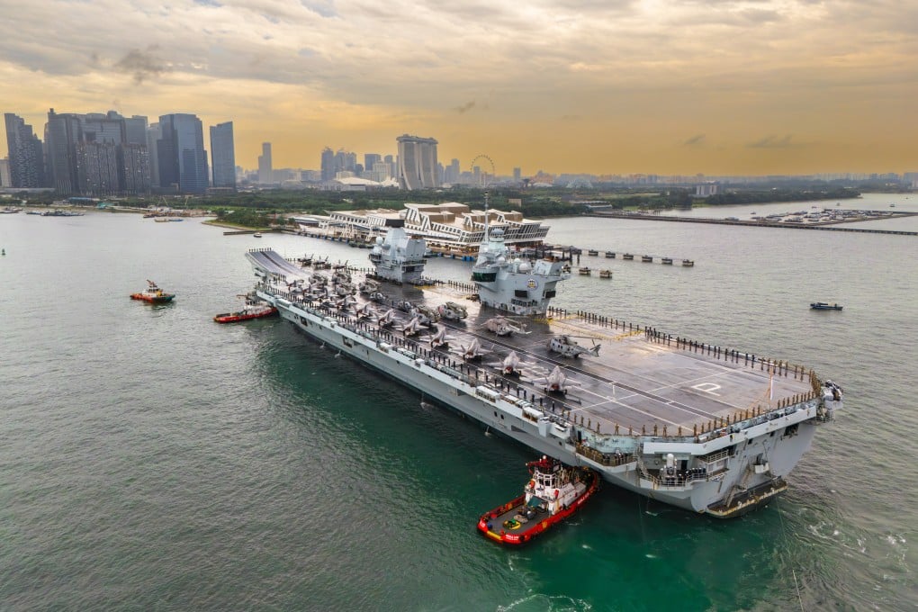 HMS Prince of Wales became the first warship to dock at the Marina Bay Cruise Centre in Singapore on June 23. It hosted public tours and a defence and security expo with British companies. Photo: Handout