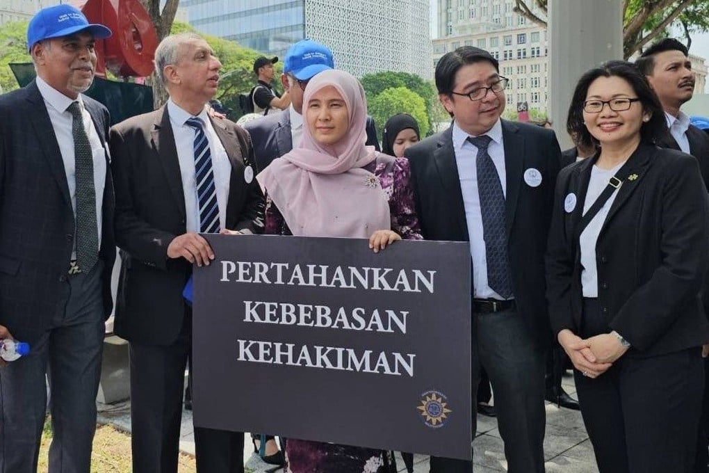 Prime Minister Anwar Ibrahim’s daughter Nurul Izzah (centre) marches with members of the Malaysian Bar to demand an investigation into the latest claims. Photo: Handout