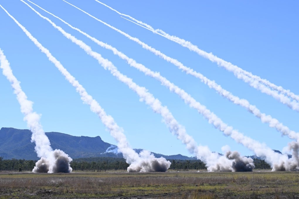 Australian and US HIMARS rockets are launched during the firepower demonstration as part of the Talisman Sabre 2025 joint military exercises on Monday. Photo: EPA