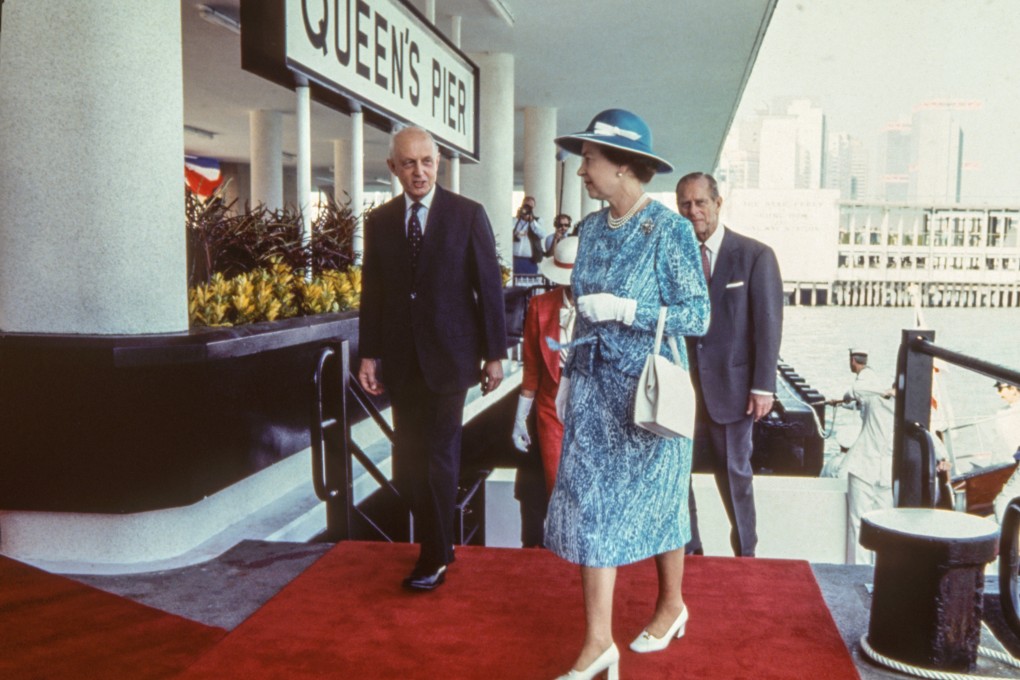 Queen Elizabeth and Prince Philip disembark at Queen’s Pier, Hong Kong, accompanied by the governor, Edward Youde, in 1986. Queen’s Pier was dismantled in 2007. Photo: SCMP Archives