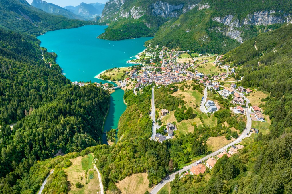 Lake Molveno, on the shores of Molveno village, in Italy’s Trentino province, has been voted Italy’s most beautiful lake several times, most recently in 2024 Photo: Getty Images