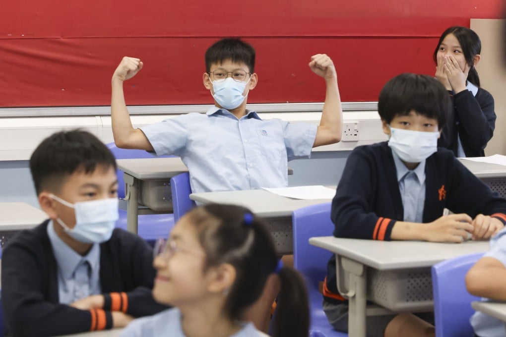 Primary Six pupils receive their school allocation results on the campus of Yaumati Catholic Primary School (Hoi Wang Road) on July 8. Photo: Nora Tam