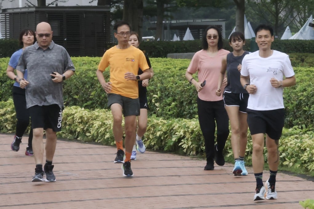 A group of Hong Kong residents jogging in Central. Photo: Jonathan Wong