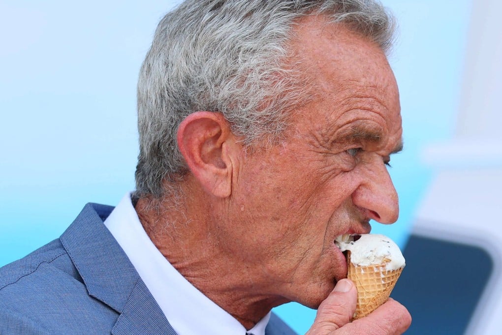 Health and Human Services Secretary Robert F. Kennedy Jnr eats a mint chocolate chip ice cream cone during a press conference announcing that ice cream makers are pledging to eliminate many artificial food dyes by the end of 2027. Photo: Getty Images/AFP