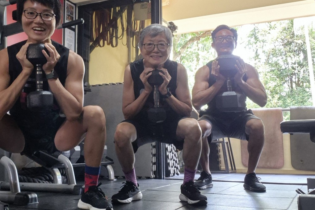 Charlotte Lim at the gym with her children, Yan Lin (left) and Tiat Lim. Known affectionately as “Pull-up Grandma” or “Auntie C”, the retired anthropologist is stronger and fitter than most people half her age. Photo: Instagram/coachwhy_yan