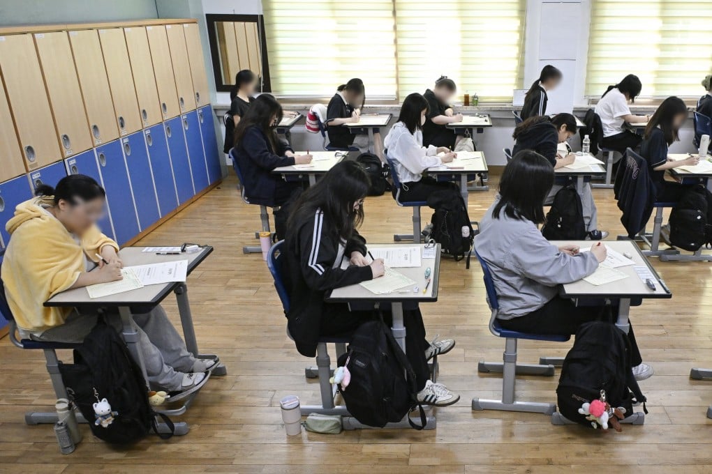Seniors sit for a nationwide mock test at a high school in Seoul. South Korea’s education system is known for the high pressure faced by its students. Photo: EPA-EFE