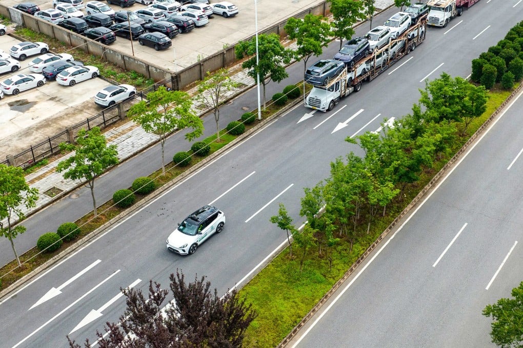 An aerial drone photo shows an Apollo Go autonomous-driving car during a road test in Wuhan, central China’s Hubei province, on July 4, 2024. Photo: Xinhua