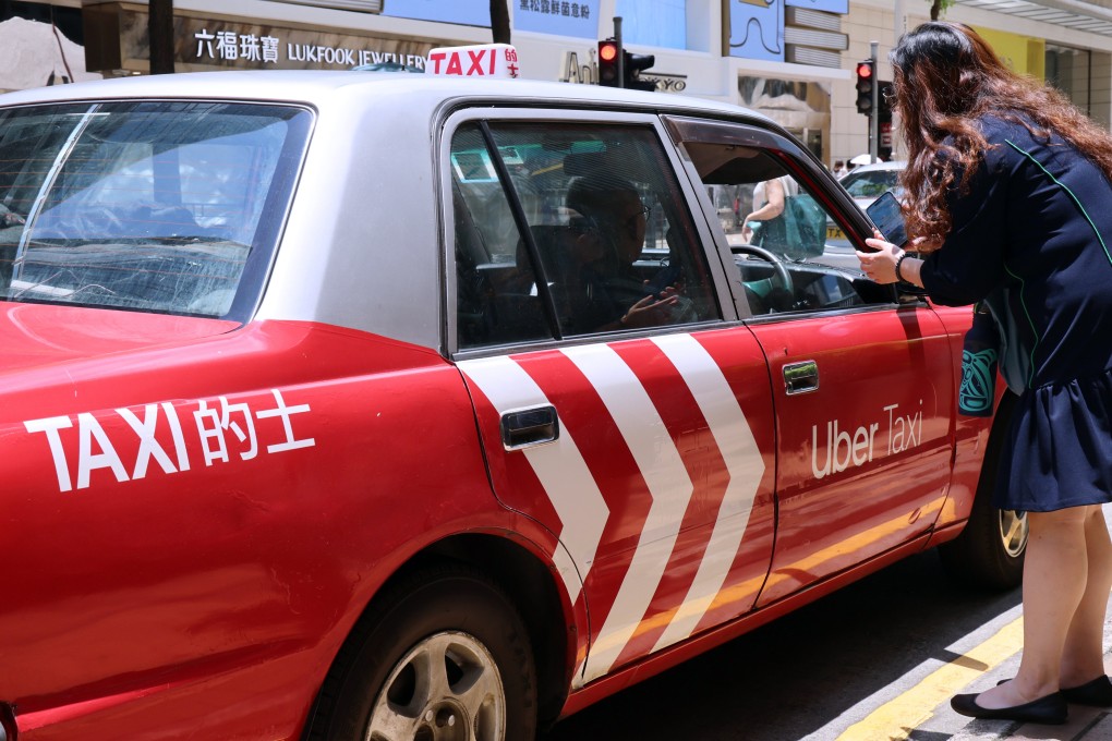 An taxi driver waits for passengers in Tsim Sha Tsui, on July 8, 2024. Photo: Jelly Tse