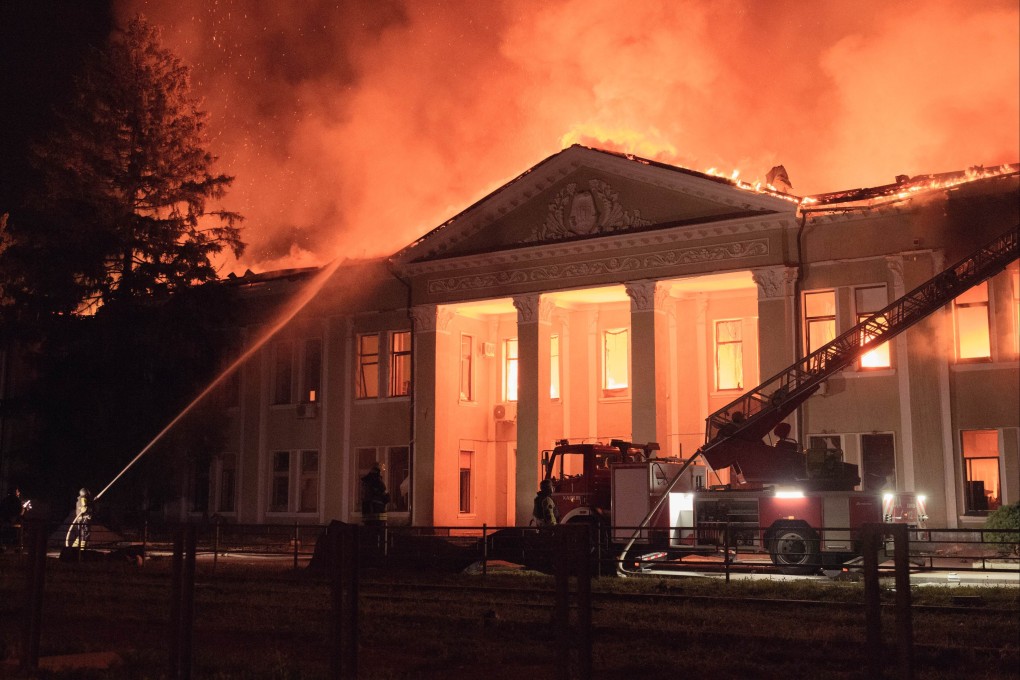 Crews try to put out a fire at the FED company administrative building that was hit by a Russian drone attack on Kharkiv. Photo: dpa