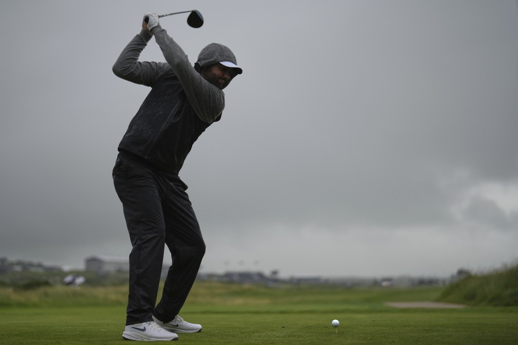 Scottie Scheffler hits his tee shot on the 9th hole during a practice round for the Open Championship at the Royal Portrush Golf Club, Northern Ireland. Photo: AP