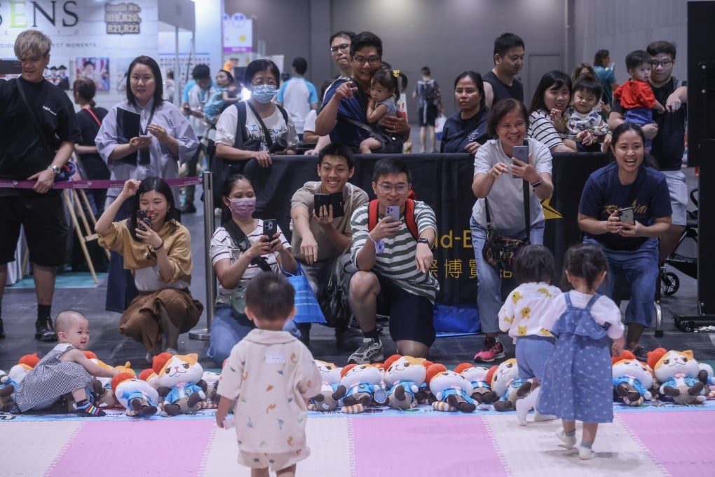 A race for toddlers is held at the 8th Children’s Book Fair & Super Parents & Kids Expo at Asia World Expo. Photo: Jonathan Wong