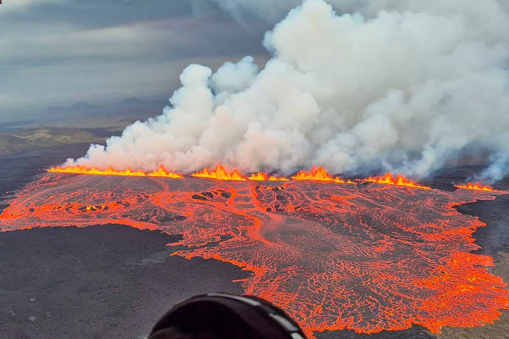 Lava and smoke erupting from a volcano near Grindavik on the Icelandic peninsula of Reykjanes. Photo: Public Defence Department of the State Police via AFP