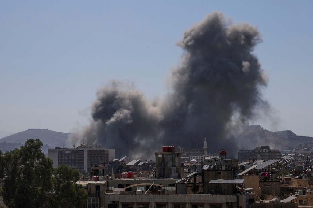 Smoke rises after Israeli strikes on Syria’s defence ministry in Damascus on Wednesday, according to Al Jazeera TV. Photo: Reuters