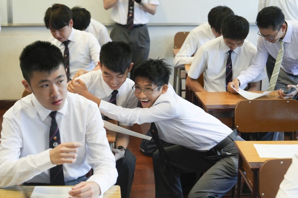 La Salle College students in Kowloon Tong react to their Diploma of Secondary Education Examination (DSE) results, on July 16. Photo: Sun Yeung