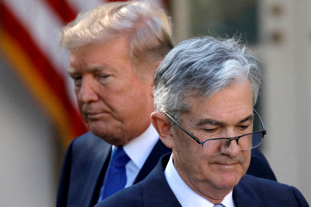 US President Donald Trump looks on as Jerome Powell moves to the podium at the White House in November 2017. Photo: Reuters