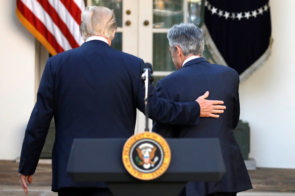 US President Donald Trump, left, leaves the Rose Garden with Jerome Powell, his nominee to become chairman of the US Federal Reserve, at the White House in Washington on November 2, 2017. Photo: Reuters