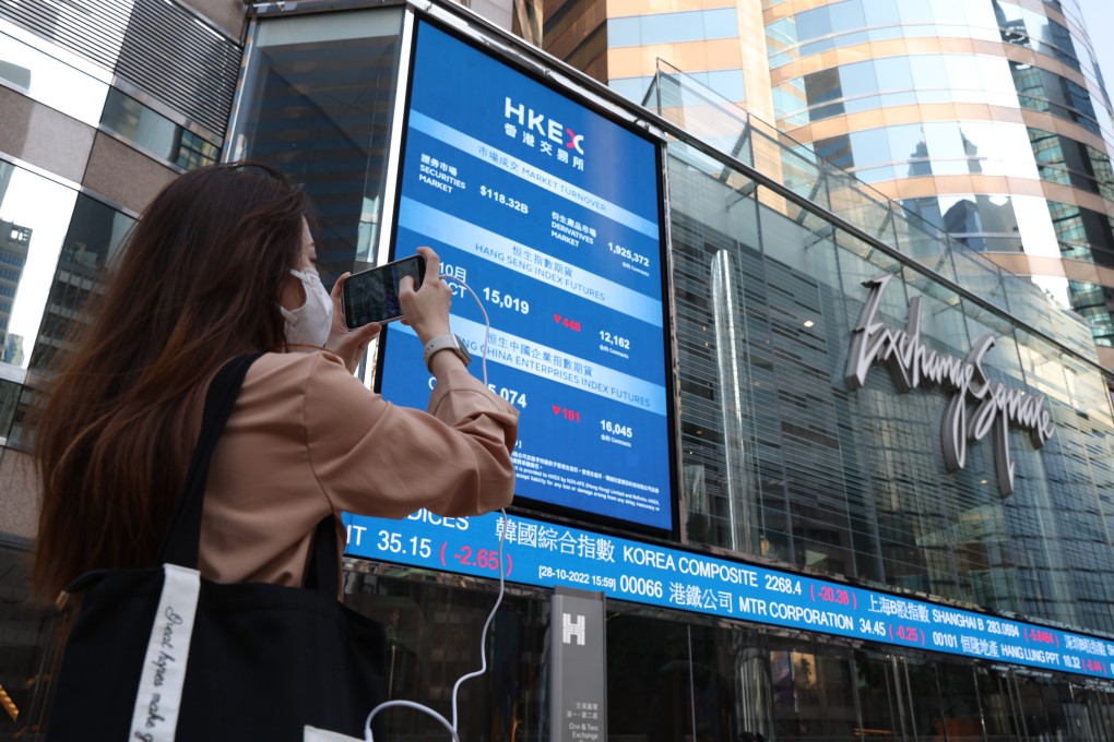 A woman passes through Hong Kong’s Exchange Square. Photo: Yik Yeung-man