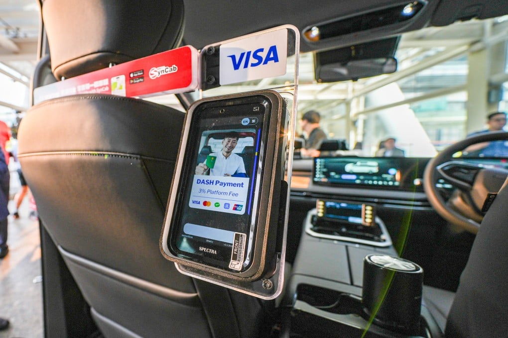 All Hong Kong taxi drivers will be required to provide at least two e-payment methods: one that uses QR codes and another that does not rely on them. Photo: Eugene Lee