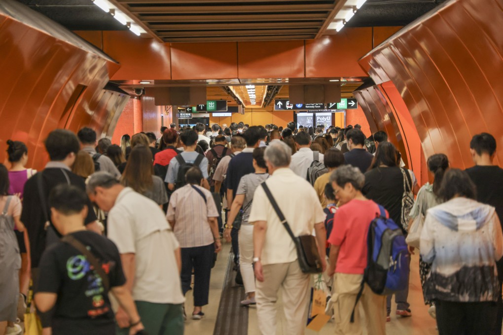 Passengers wait to catch a train at North Point station on July 18. A malfunction of the signalling system on the Tseung Kwan O line led to long queues on train platforms at some stations. Photo: Jelly Tse