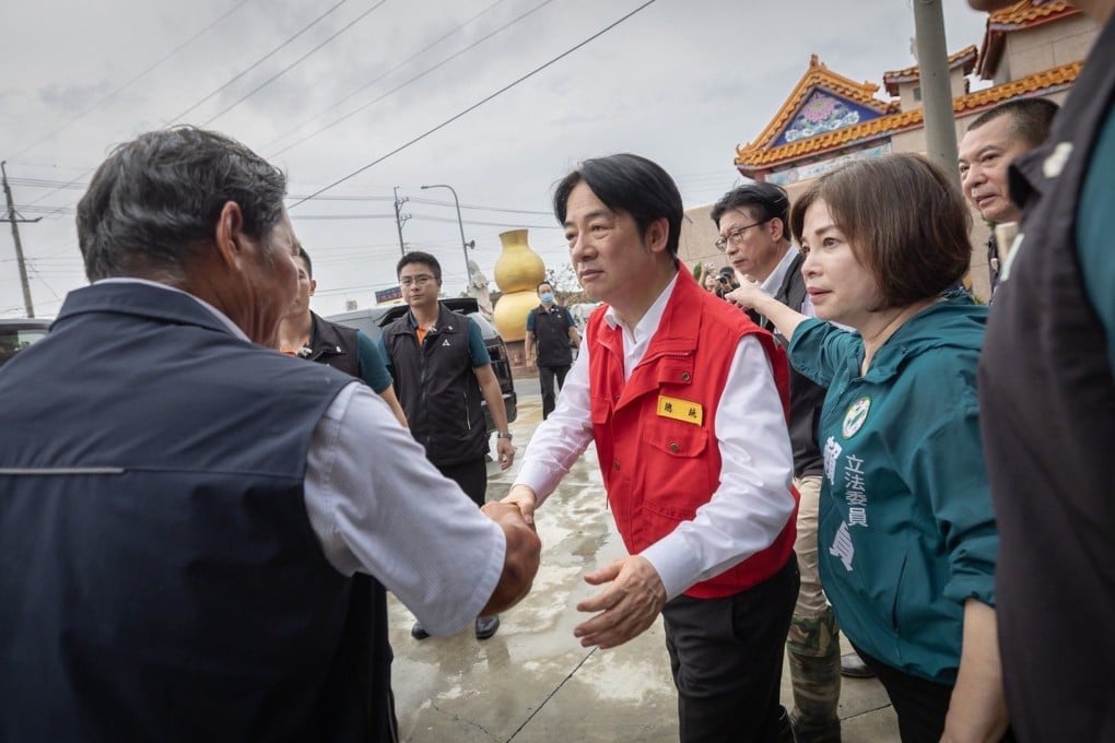 William Lai visits Tainan after it was battered by Typhoon Danas in early July. His response was criticised as “tone-deaf”. Photo: Handout