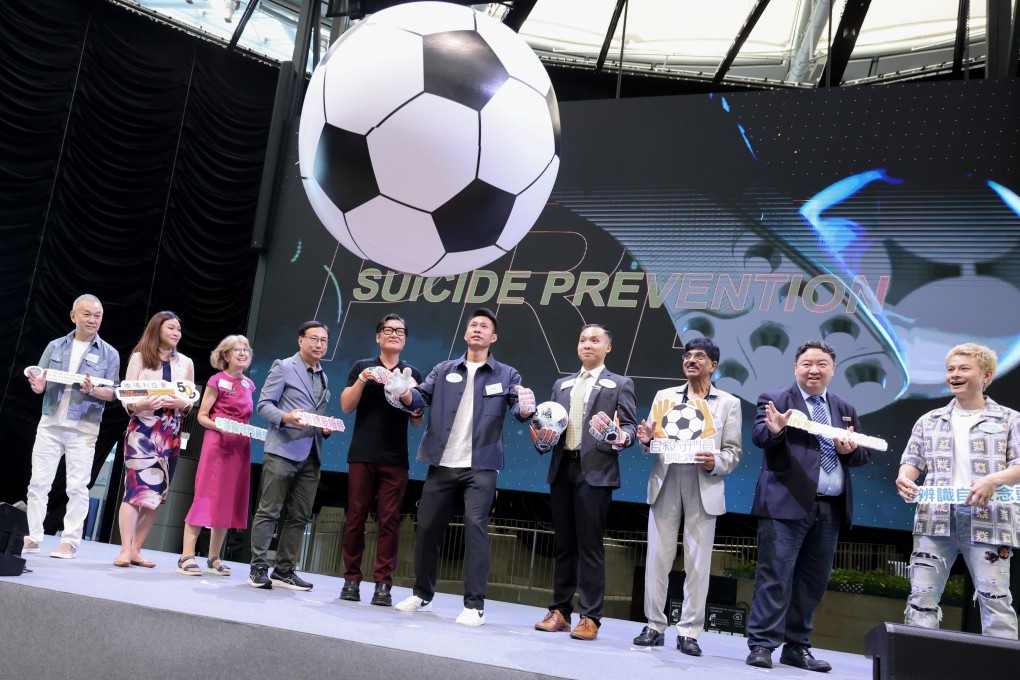 Yapp Hung-fai (centre), captain of Hong Kong’s football team, and other guests kick off The Samaritans’ “Online Suicide Gatekeeping Course” at Cyberport in Pok Fu Lam, Hong Kong, on May 17 to raise public awareness of student suicides. Photo: Nora Tam