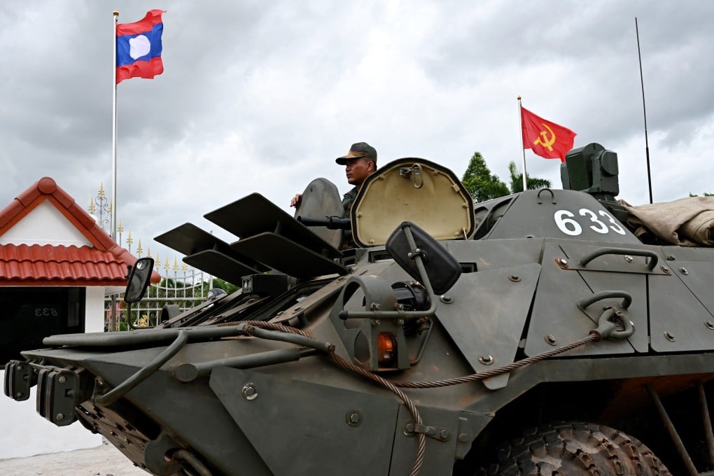 A Laotian soldier looks on from an armoured vehicle during the Asean Foreign Ministers’ Meeting in Vientiane last year. Photo: AFP