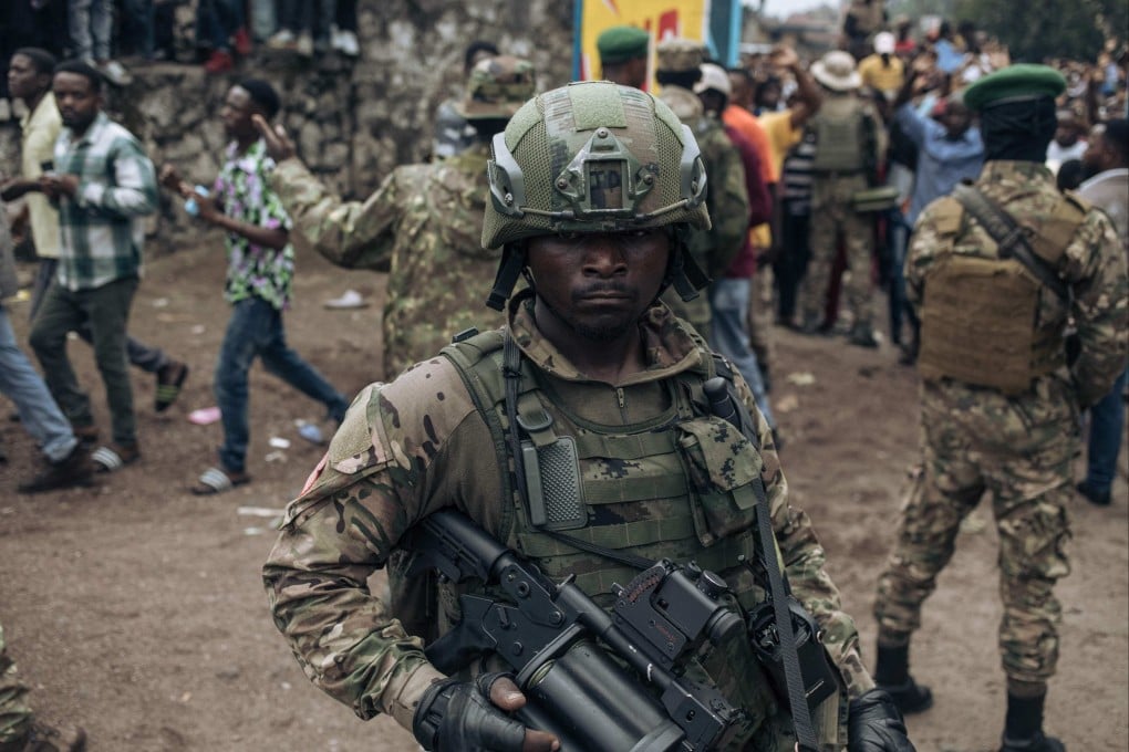 M23 soldiers are seen during a public gathering in February. The Democratic Republic of Congo and Rwanda-backed armed group M23 signed a ceasefire deal on Saturday to end fighting that has devastated the country’s mineral-rich but conflict-torn east. Photo: AFP