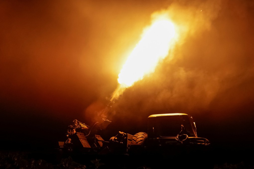 A Ukrainian serviceman fires an anti-aircraft machine gun towards a Russian drone in Kharkiv region, Ukraine, on Thursday. Photo: Reuters