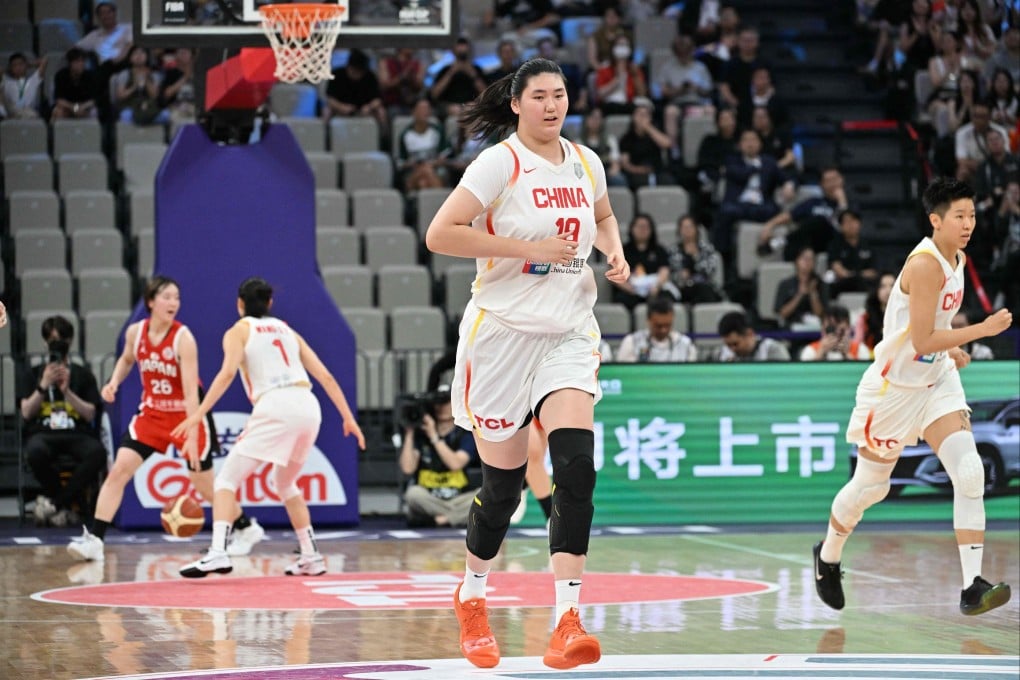 China’s Zhang Ziyu heads back down the court during her side’s semi-final against Japan in Shenzhen. Photo: AFP