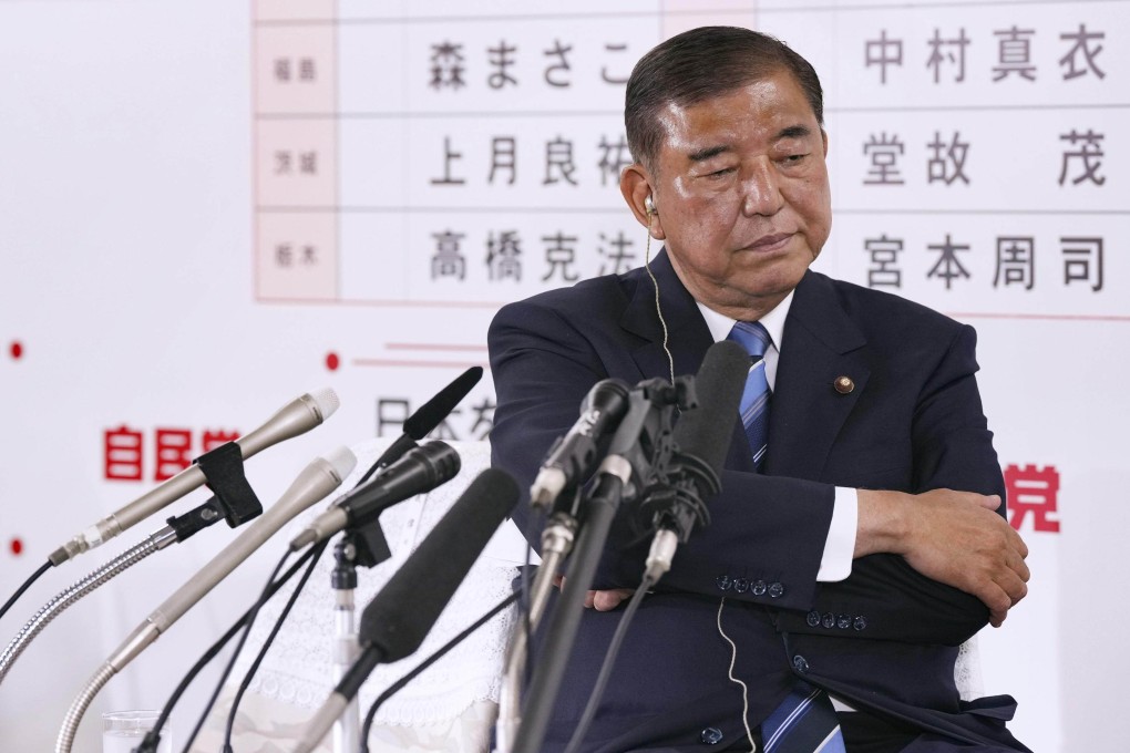 Japanese Prime Minister Shigeru Ishiba reacts at the Liberal Democratic Party’s headquarters in Tokyo on Sunday as the results of the House of Councillors election came in. Photo: Kyodo