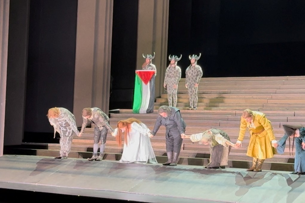 Cast members bow as one holds a Palestinian flag, during the curtain call of Il Trovatore at the Royal Opera House in Covent Garden, London, Britain on Sunday. Photo: @sydcas via Reuters
