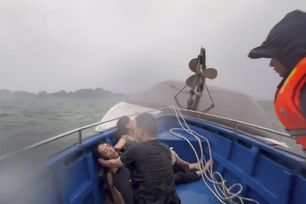 People on a rescue boat after their tourist boat capsized in Ha Long Bay, Vietnam on Saturday. Photo: QDND/AP