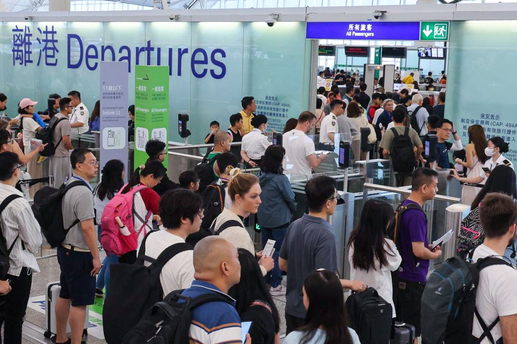 Thousands of passengers have filled Hong Kong’s airport to catch flights delayed by Typhoon Wipha. Photo: Dickson Lee