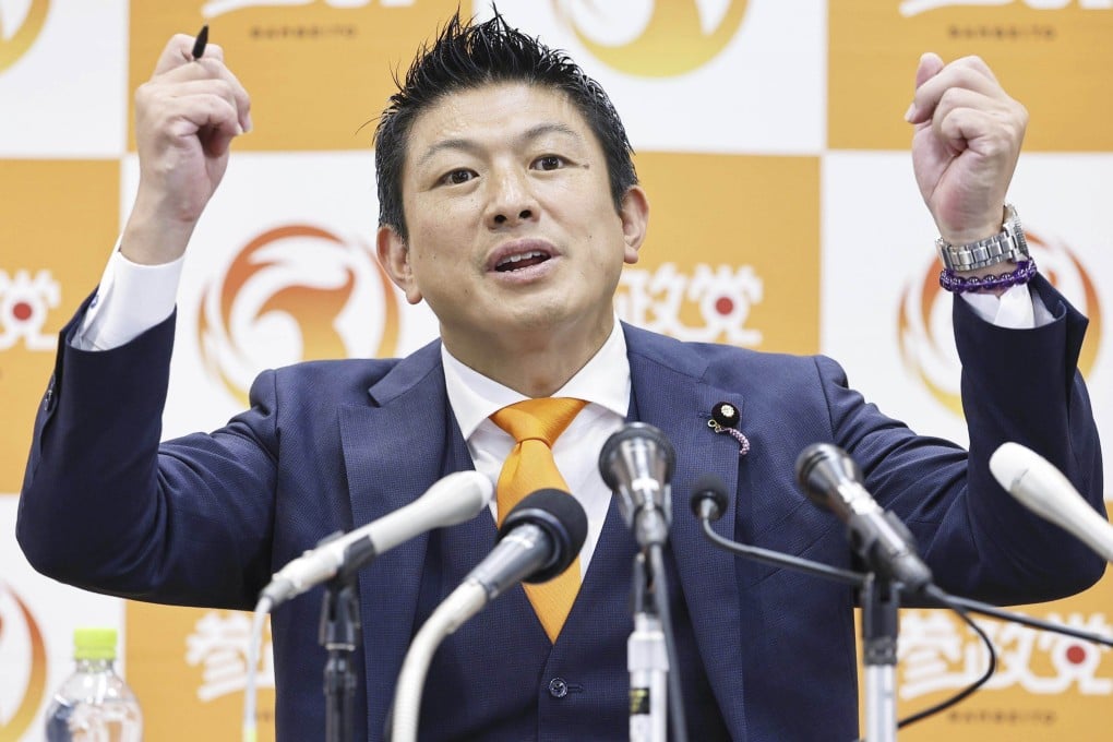 Sohei Kamiya, Sanseito’s leader, speaks to the media following the upper house election in Tokyo on Sunday. Photo: Kyodo/AP