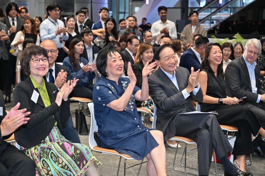 Peter Wong (right, centre), chairman of The Hongkong and Shanghai Banking Corporation (HSBC) and The Hongkong Bank Foundation, with Rosanna Wong (left, centre), a former member of the Legislative Council and Executive Council who received the HSBC Social Work Scholarship in the 1970s. Photo: HSBC