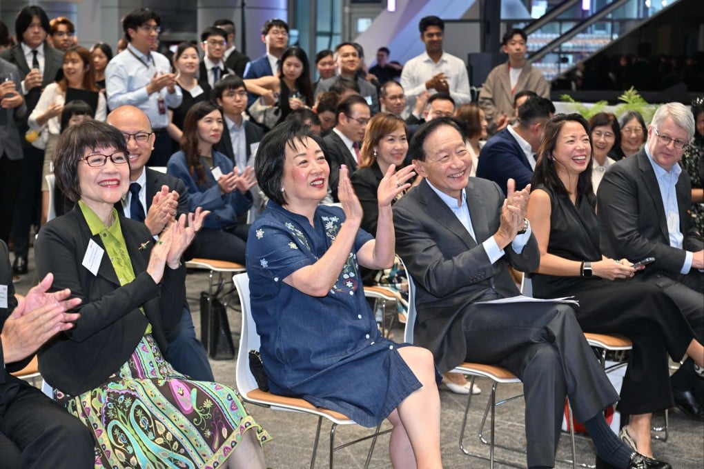 Peter Wong (right, centre), chairman of The Hongkong and Shanghai Banking Corporation (HSBC) and The Hongkong Bank Foundation, with Rosanna Wong (left, centre), a former member of the Legislative Council and Executive Council who received the HSBC Social Work Scholarship in the 1970s. Photo: HSBC
