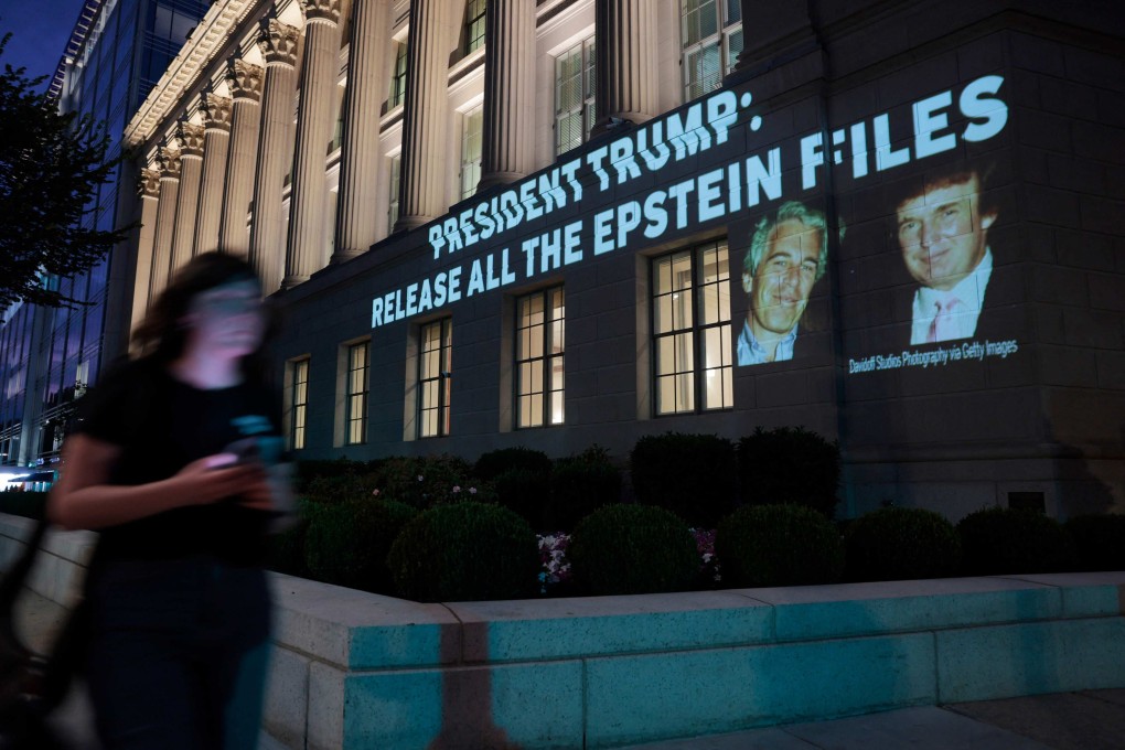 A message with an image of Donald Trump and Jeffrey Epstein projected onto the US Department of Commerce headquarters in Washington DC. Photo: AFP
