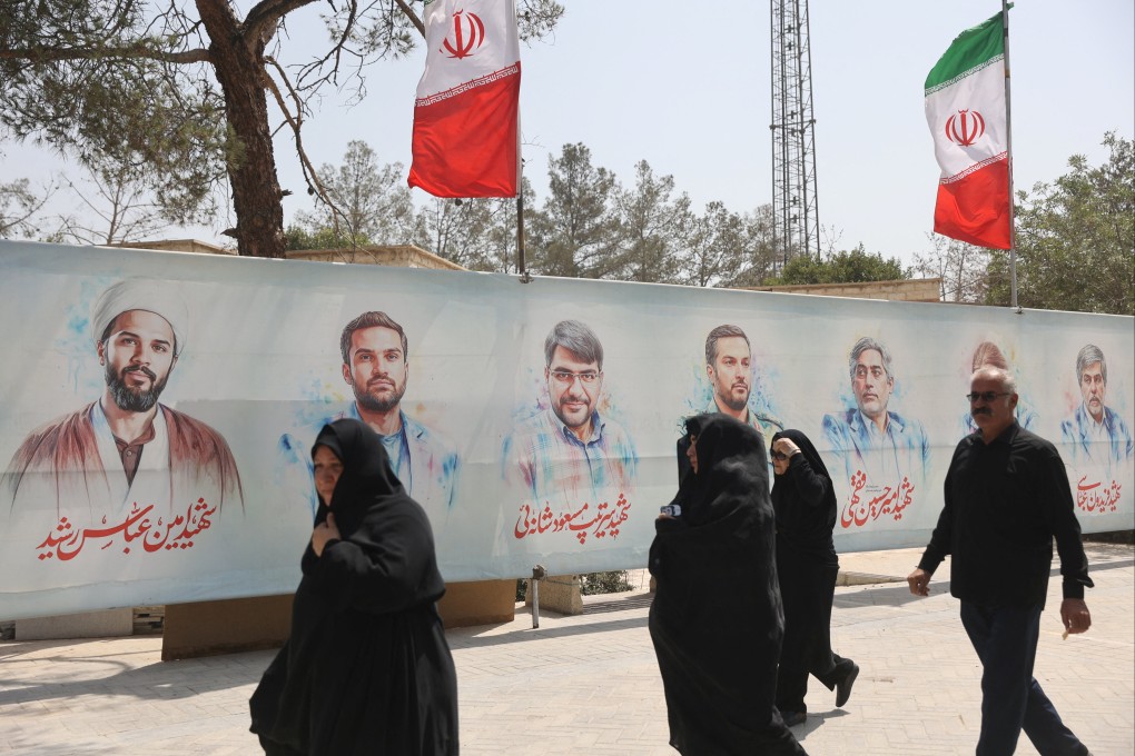 Pictures of Iranian military commanders and nuclear scientists and others killed in Israeli strikes, at a cemetery in southern Iran. Photo: West Asia News Agency via Reuters