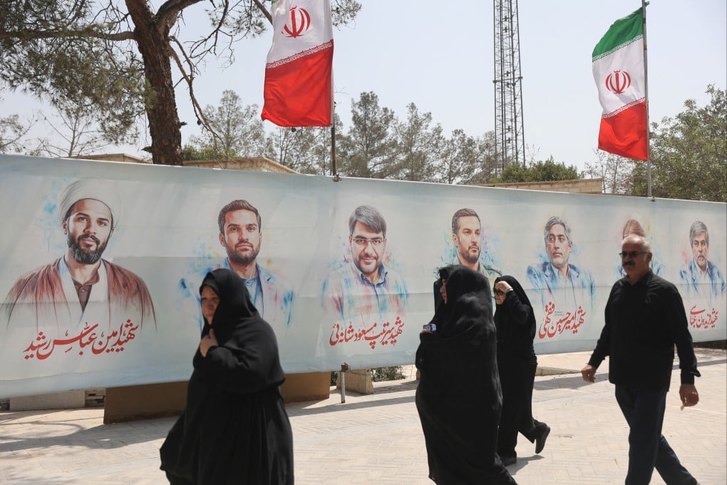 Pictures of Iranian military commanders and nuclear scientists and others killed in Israeli strikes, at a cemetery in southern Iran. Photo: West Asia News Agency via Reuters