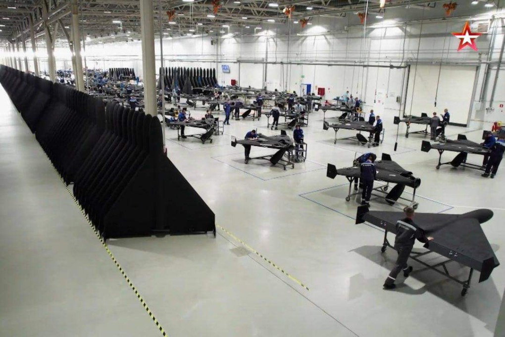 Zvezda TV video showed workers with their faces blurred assembling jet-black triangle-shaped attack drones. Photo: x.com/NOELreports
