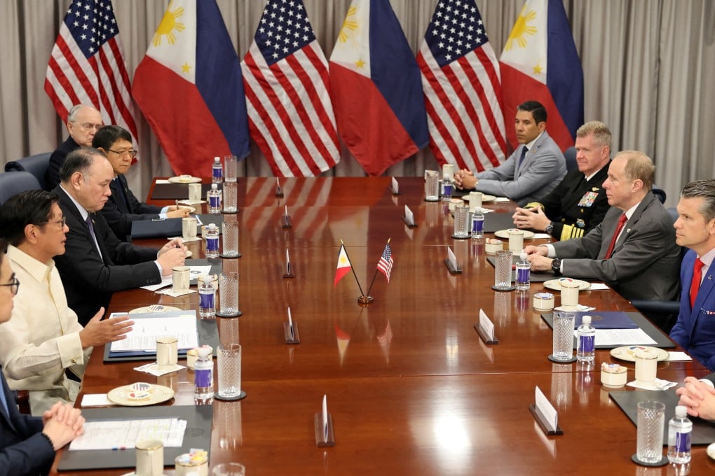 Philippine President Ferdinand Marcos Jnr (left, without jacket) speaking with US Defense Secretary Pete Hegseth at the Pentagon on Monday. Photo: Reuters
