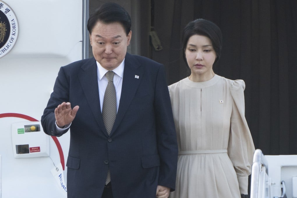 Kim Keon-hee accompanies her husband, Yoon Suk-yeol, to Washington on July 10 last year. Photo: AP