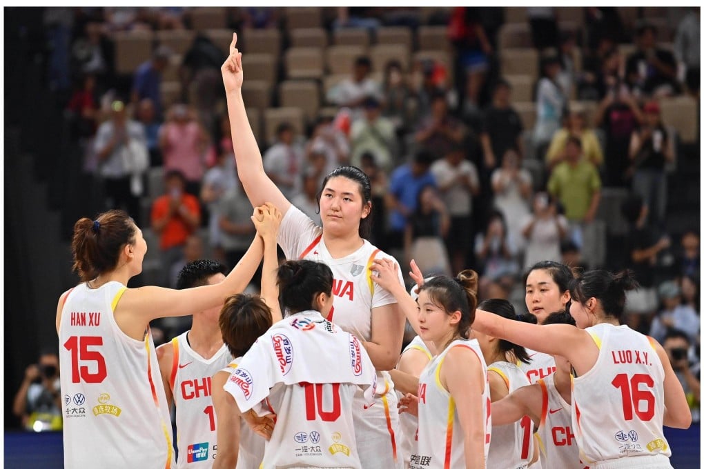Zhang Ziyu (centre) celebrates victory over New Zealand at the Fiba Women’s Asia Cup in Shenzhen on Wednesday. Photo: Xinhua